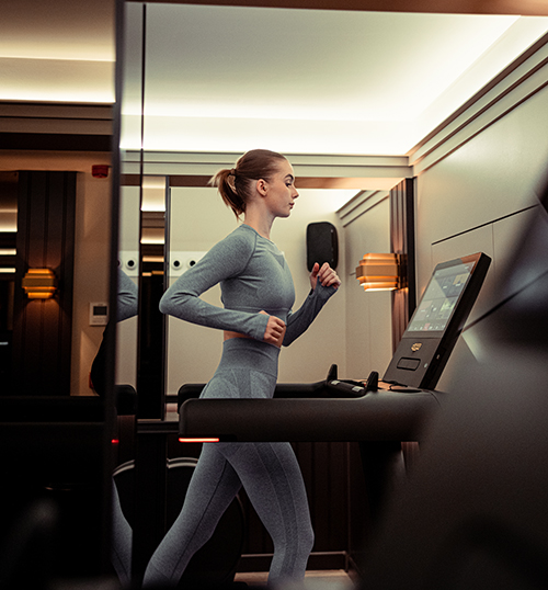 woman running at the gym